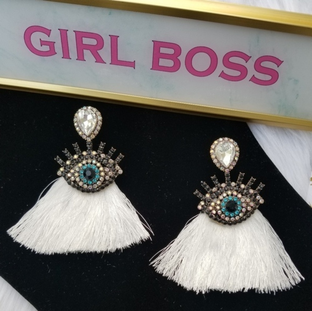 White eye fringe earrings
